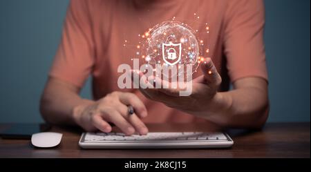 Businessman Using Computer and holding Global network connection, Big data analytics and business intelligence, Digital link tech, Learning online, Cy Stock Photo
