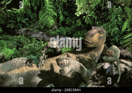 Aladar & Lemurs Film: Dinosaur (2000) Characters: Aladar &  Director: Eric Leighton 13 May 2000   **WARNING** This Photograph is for editorial use only and is the copyright of WALT DISNEY and/or the Photographer assigned by the Film or Production Company and can only be reproduced by publications in conjunction with the promotion of the above Film. A Mandatory Credit To WALT DISNEY is required. The Photographer should also be credited when known. No commercial use can be granted without written authority from the Film Company. Stock Photo