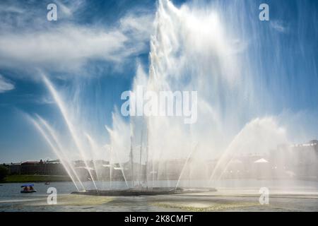 Fountain on blue sky background, Kazan, Tatarstan, Russia. Scenic view of big nice waterfall in Kaban Lakes in summer. It is tourist attraction of cit Stock Photo