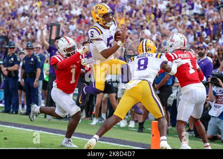Baton Rouge, LA, USA. 22nd Oct, 2022. LSU quarterback Jayden Daniels (5) leaps for the endzone during NCAA football game action between the Ole Miss Rebels and the LSU Tigers at Tiger Stadium in Baton Rouge, LA. Jonathan Mailhes/CSM/Alamy Live News Stock Photo