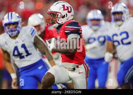 Lynchburg, Virginia, USA. 22nd Oct, 2022. Liberty Flames running back Shedro Louis (1) carries the ball during the NCAA football game between the Brigham Young Cougars and the Liberty Flames at Williams Stadium in Lynchburg, Virginia. Greg Atkins/CSM/Alamy Live News Stock Photo