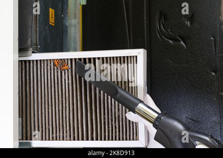 Replacing filter in the central ventilation system. hvac filter replacing home central air system Stock Photo