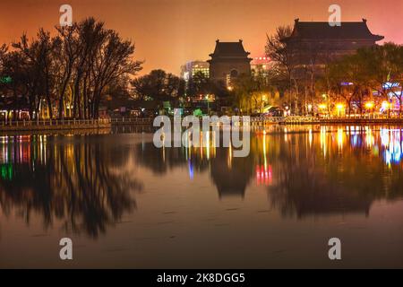 Houhai Lake Night Illuminated Drum and Bell Tower Beijing China Old Beijing swimming hole Now night life district with bars and restaurants Stock Photo