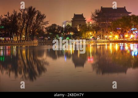 Houhai Lake Night Illuminated Drum and Bell Tower Beijing China Old Beijing swimming hole Now night life district with bars and restaurants Stock Photo