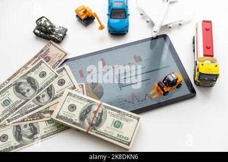 different types of toy transport and a tablet Stock Photo