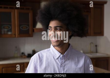 Headshot portrait African hipster guy pose in domestic kitchen Stock Photo