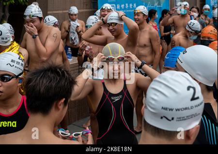 Hong Kong, China. 22nd Oct, 2022. Participants wait at the start line during the annual swimming competition New World Harbour Race in Hong Kong. Credit: SOPA Images Limited/Alamy Live News Stock Photo