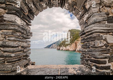 View of Portovenere, near the villages of the Cinque Terre, a Unesco World Heritage Site. Colorful village of Italy. Stock Photo