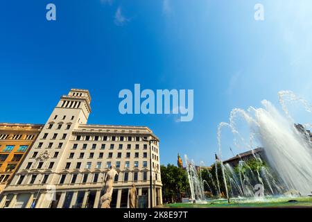 Catalunya square (Placa de Catalunya or Plaza de Cataluna) is a large square in central Barcelona that is generally considered to city center. Spain. Stock Photo