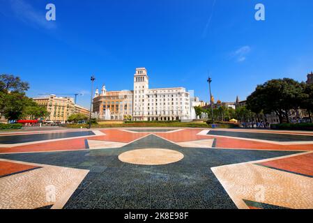 Catalunya square (Placa de Catalunya or Plaza de Cataluna)  is a large square in central Barcelona that is generally considered to city center. Spain. Stock Photo
