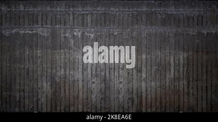 Front view of messy and dirty dark gray concrete wall. High resolution full frame textured background. Copy space. Stock Photo