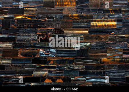 Tiger Eye Blue slab. Matt natural dark texture. Semiprecious, gemstone stone for ceramic wall, floor digital tiles. Material texture for unique Stock Photo