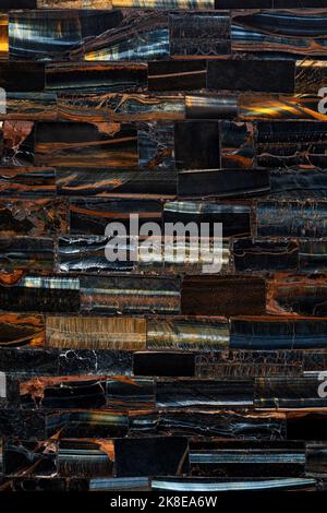 Tiger Eye Blue slab. Semi precious mineral pattern. Polished semiprecious stone for ceramic wall and floor digital tiles. Material for unique interior Stock Photo