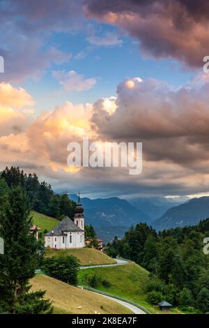 Maria Gern Church and Bavarian Alps with Watzmann Mountain during Sunset, Germany, Europe Stock Photo
