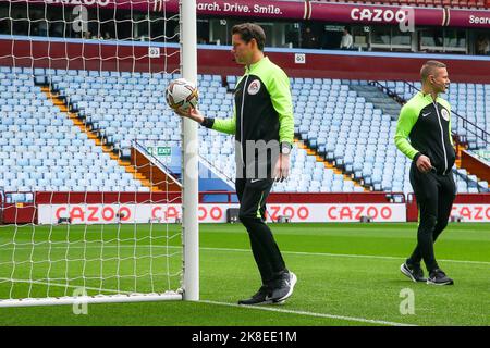 Referee Darren England checks on Joelinton #7 of Newcastle United ...