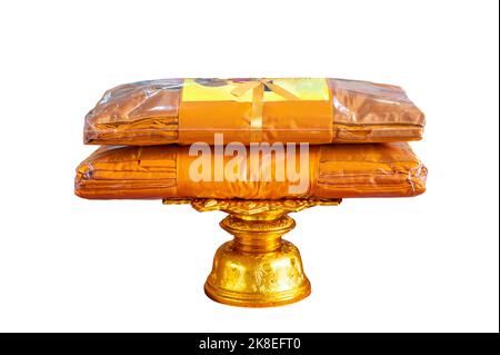 set of monk's robes placed on a pedestal on a white background isolate Stock Photo