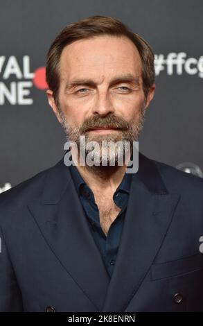 Cologne, Germany. 21st Oct, 2022. Actor Alexander Jovanovic arrives for the screening of the film ' Souls ' at the 32nd Film Festival Cologne (formerly: Cologne Conference) 2022, an international film festival Credit: Horst Galuschka/dpa/Horst Galuschka dpa/Alamy Live News Stock Photo