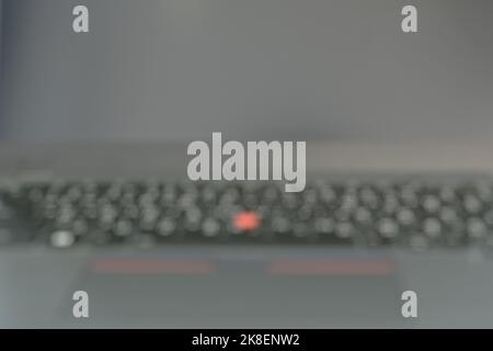 blurry keyboard on black compute laptop background and texture Stock Photo