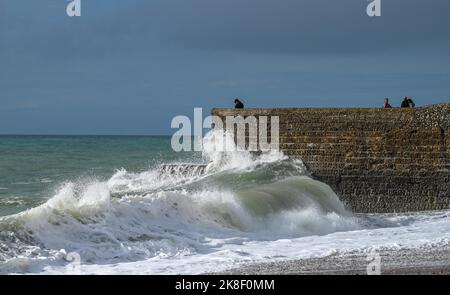 Brighton UK 23rd October 2022 - Visitors enjoy an unusually warm day for the time of year on Brighton seafront  today as temperatures are expected to reach 20 degrees in some parts of the South East  . : Credit Simon Dack / Alamy Live News Stock Photo