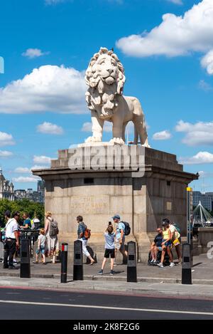 The South Bank Lion statue outside County Hall, which was headquarters of London County Council (LCC) on the South Bank, Lambeth. Visitors Stock Photo