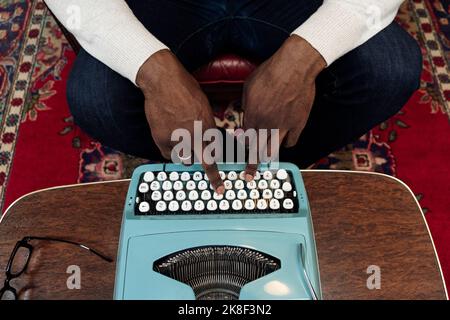 Hands of businessman typing on vintage typewriter Stock Photo