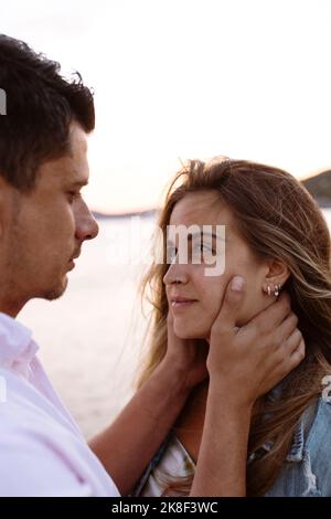Romantic young couple looking at each other Stock Photo