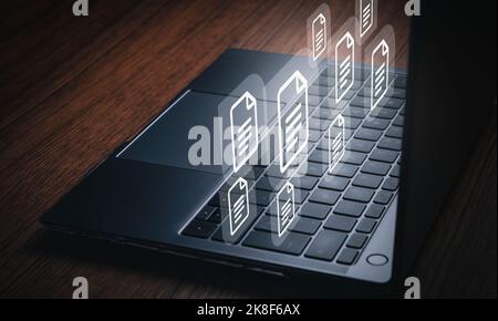 Laptop with VR interface of documents. Document Management System (DMS) concept. Process automation to efficiently manage files. Stock Photo