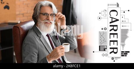 Mature bearded businessman drinking coffee in office Stock Photo