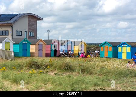 Colourful Amble Beach Huts on Little Shore, Harbour Road, Amble, Northumberland, England, United Kingdom Stock Photo