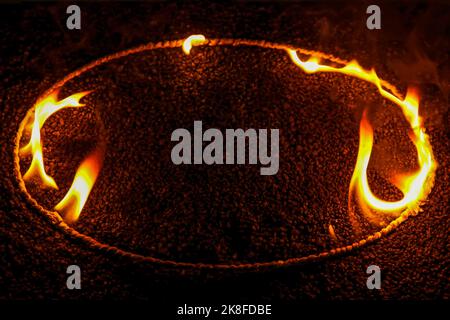 Frame made of burning rope on black background Stock Photo
