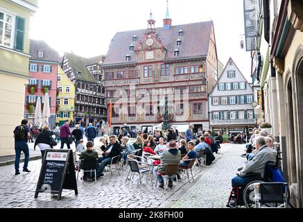 23 October 2022, Baden-Württemberg, Tübingen: In front of the city hall, the seats in the cafes on the street are all taken. A new mayor is elected here. Photo: Bernd Weißbrod/dpa Stock Photo