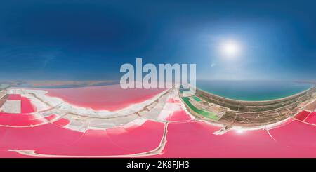 Pink salt lake bright lagoons. Aerial Seamless 360 degree spherical equirectangular panorama of colorful exotic pink salt lagoon on a sunny summer day Stock Photo