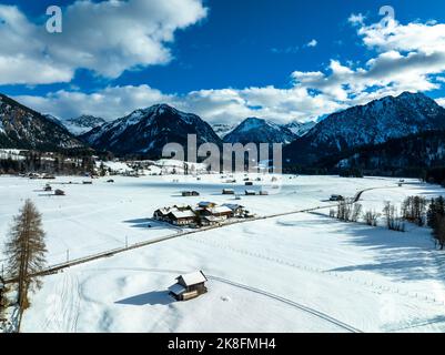 Germany, Bavaria, Oberstdorf, Aerial view of Illertal in winter Stock Photo