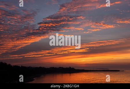 A beautiful summer sunset was photographed from Spiral Beach in Victoria,  Canada. The view is of the Olympic Mountains range across the Salish Sea  Stock Photo - Alamy