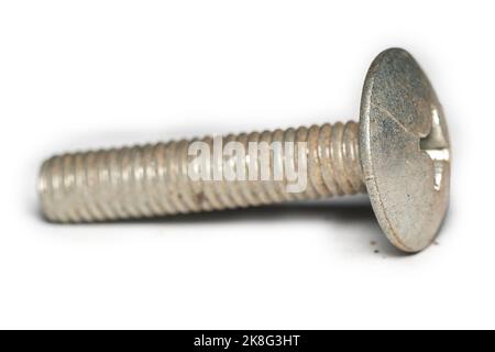 Old rusted screws on a white background Stock Photo