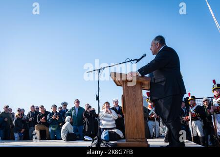 Secretary of the Navy Carlos Del Toro greets the crew in the hangar bay ...