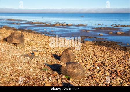 Rocky shore of lake Ilmen, Novgorod region, Russia Stock Photo