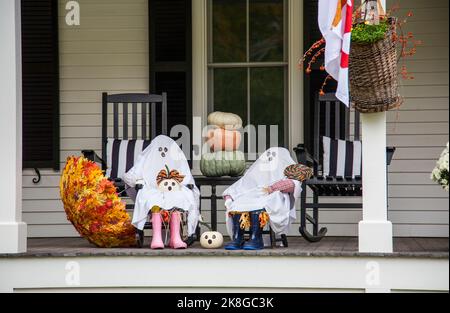 Autumn umbrella decorations on a front porch display, Woodstock, Vermont, VT USA US Halloween decor New England Landscape Stock Photo