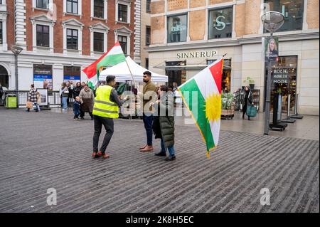Demonstration against the Iranian government. Showing a man and a woman holding an Iranian flag in Aarhus, Denmark on 22 October 2022 October 2022 Stock Photo