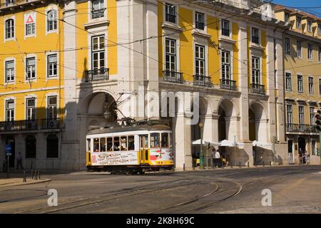 Old electric trolley car on a city street in Lisbon, Portugal. Stock Photo