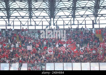 Milan, Italy. 22nd Oct, 2022. Italy, Milan, oct 22 2022: Monza's supporters wave the flags and show banners in the stands during soccer game AC MILAN vs MONZA, Serie A Tim 2022-2023 day11 San Siro stadium (Photo by Fabrizio Andrea Bertani/Pacific Press) Credit: Pacific Press Media Production Corp./Alamy Live News Stock Photo