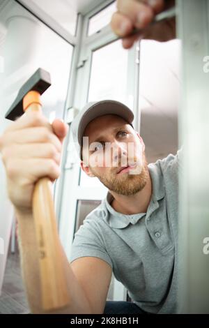 building and construction man builder in work clothes Stock Photo