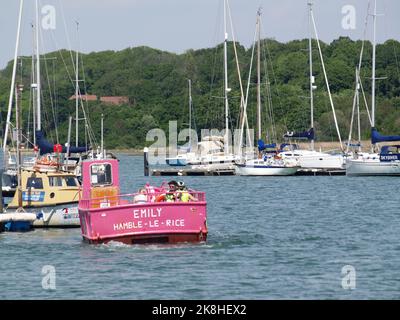 Pink painted Hamble Warsash Ferry Emily on the Hamble River, Southampton, Hampshire, UK Stock Photo