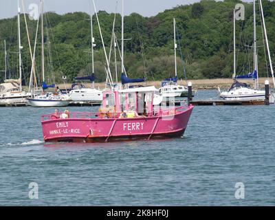 Pink painted Hamble Warsash Ferry Emily on the Hamble River, Southampton, Hampshire, UK Stock Photo