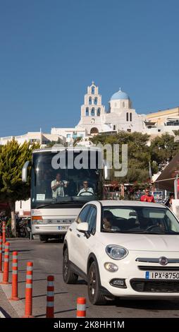 Pyrgos Kallistis, Santorini, Greece. 2022. Tourist bus driving through Pyrgos on the Aegean Island of Santorini. Stock Photo