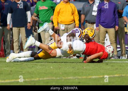 October 22, 2022: LSU's Harold Perkins Jr. (40) brings down Ole Miss quarterback Jaxson Dart (2) during NCAA football game action between the Ole Miss Rebels and the LSU Tigers at Tiger Stadium in Baton Rouge, LA. Jonathan Mailhes/CSM Stock Photo