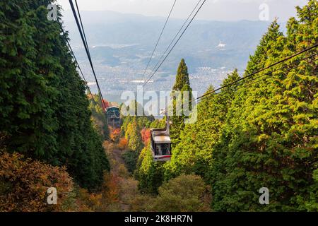 Daytime view of the beautiful fall color along the Eizan Cable Car railway at Kyoto, Japan Stock Photo