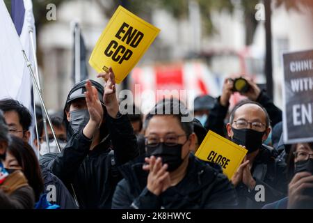 London, UK. 23rd Oct, 2022. Protesters hold placards opposite Downing street in London, Britain on October 23, 2022.Hundreds of people gather at Downing Street''‹, then''‹ march to the Chinese Embassy via Chinatown under a sudden rainstorm in London, to protest against the assault incident in which a Hong Kong protester Bob Chan, who was seen being pulled into the grounds of a Chinese consulate in Manchester and beaten by staff on October 17, 2022. (Credit Image: © May James/ZUMA Press Wire) Credit: ZUMA Press, Inc./Alamy Live News Stock Photo