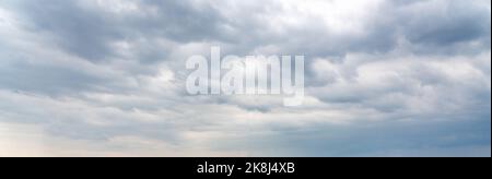 Dramatic sky background. Stormy clouds in dark sky. Moody cloudscape Stock Photo