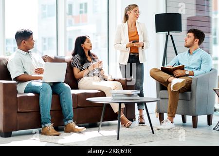 Do you really think that idea would work for us. a group of businesspeople having a discussion in an office. Stock Photo